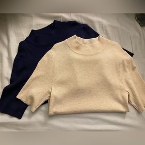 Fitted crème and navy tops